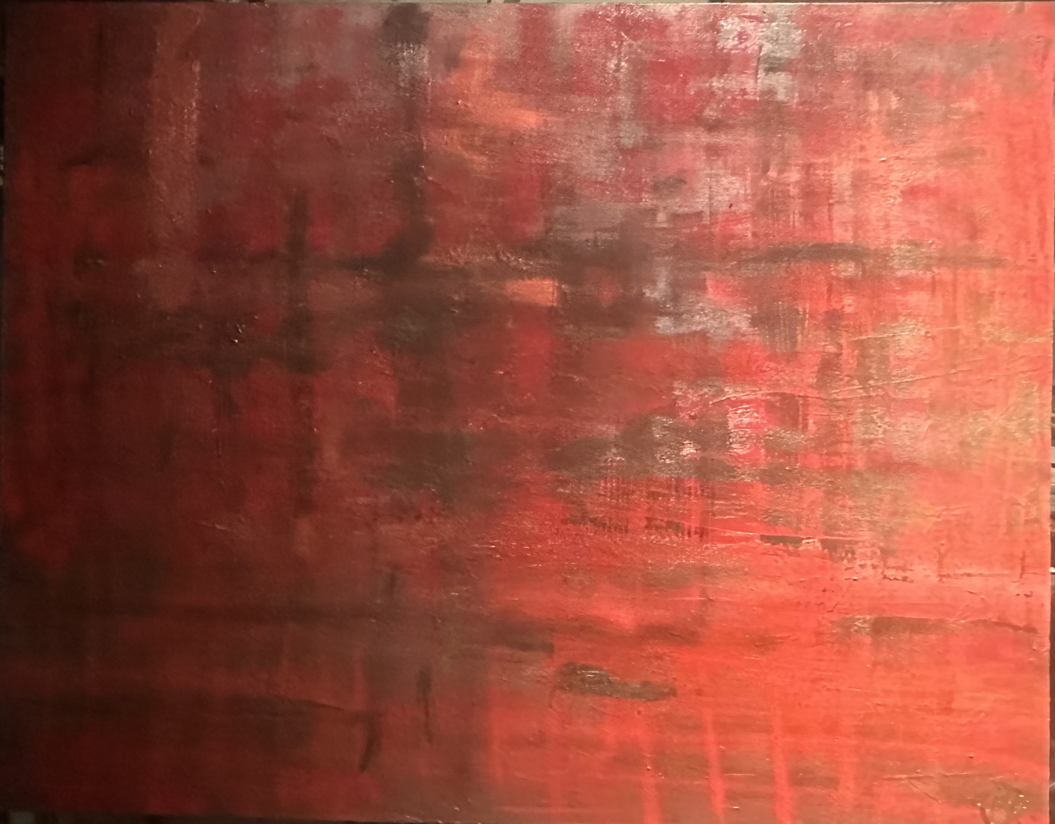 A rich red field with dark, gestural layers and textured passages.